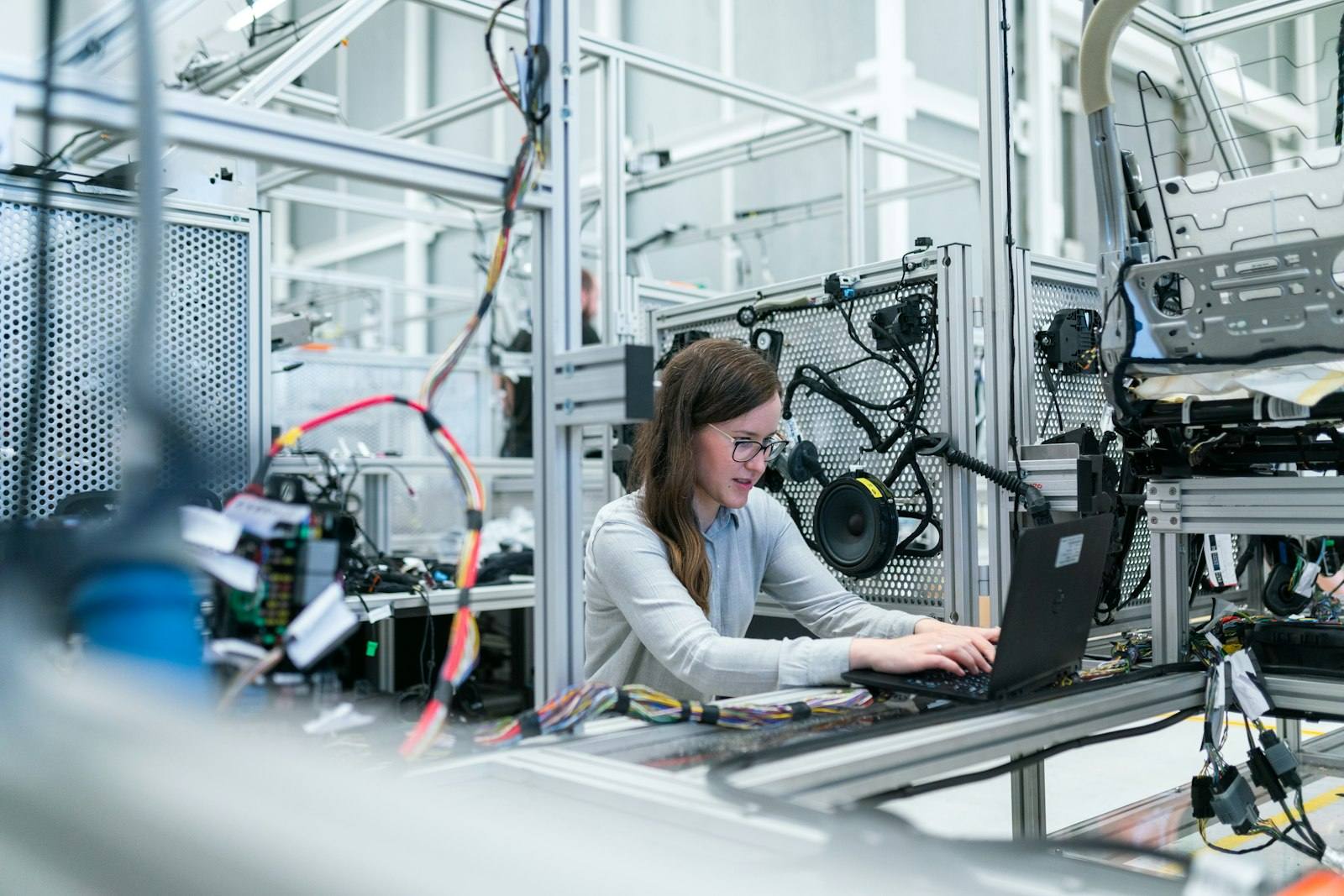 Engineer working at an instrumented manufacturing station
