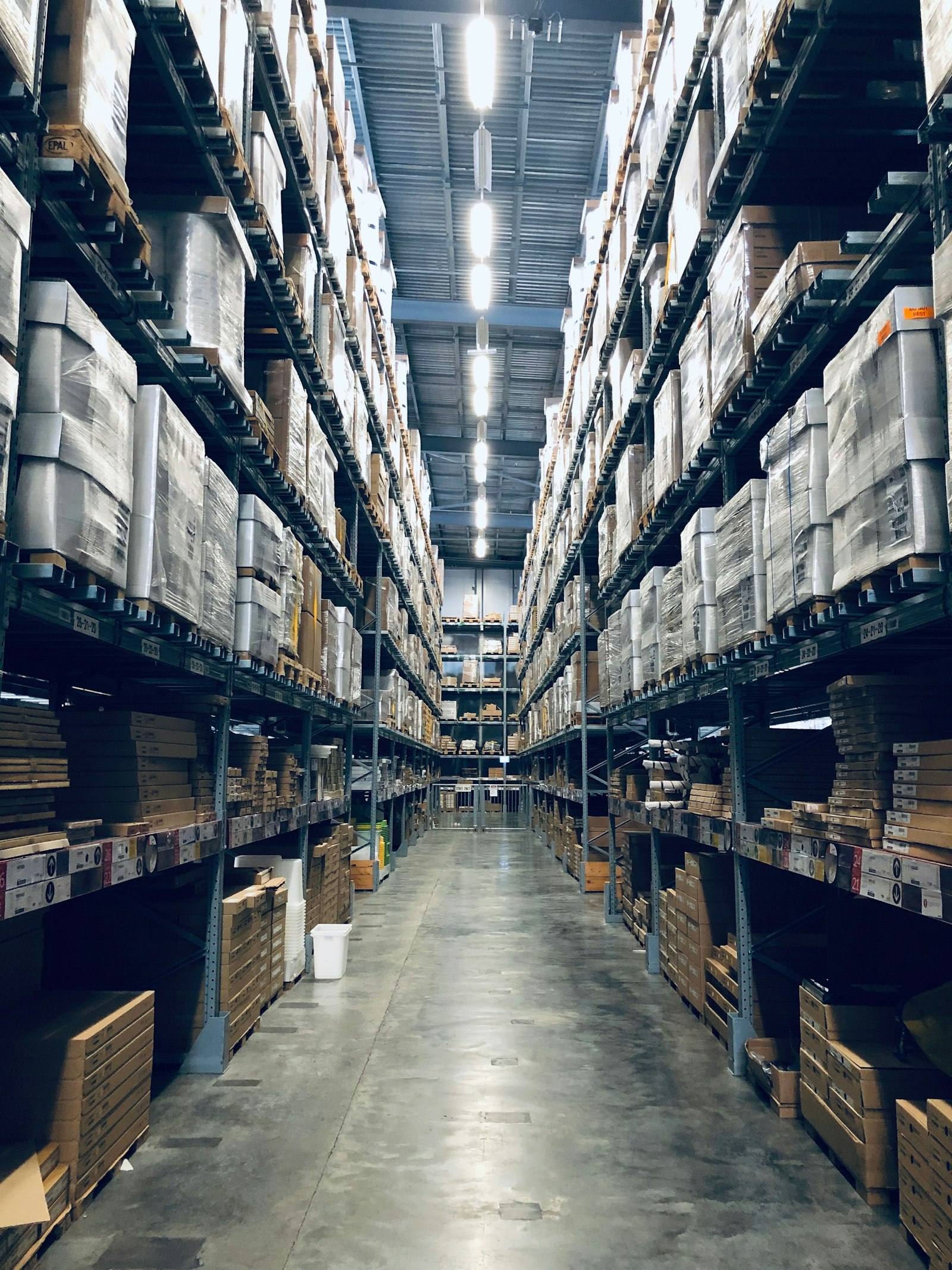 Warehouse aisle stocked with palletized goods